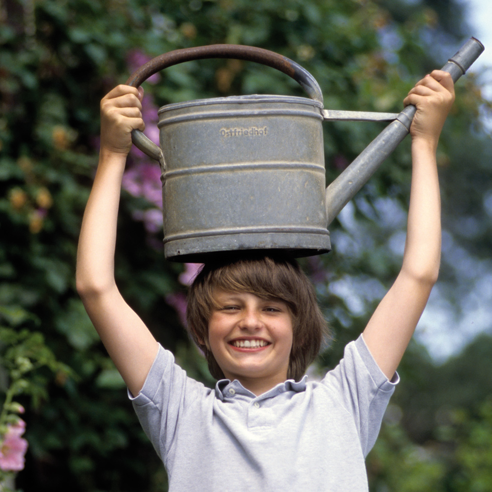 Boy with watering can